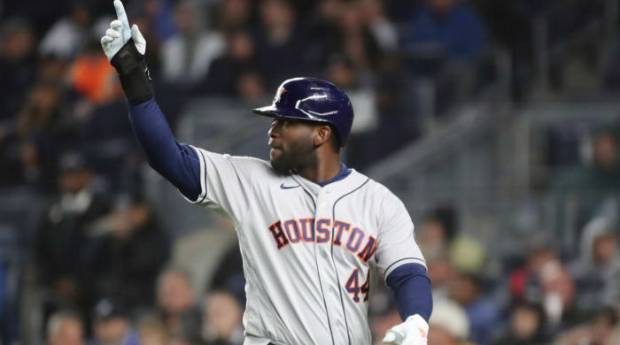 Astros DH Yordan Alvarez celebrates scoring a run in Game 5 of the 2022 NLCS.